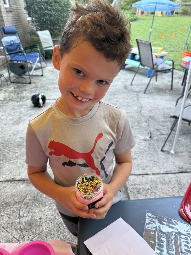 Bryson holding customized slime